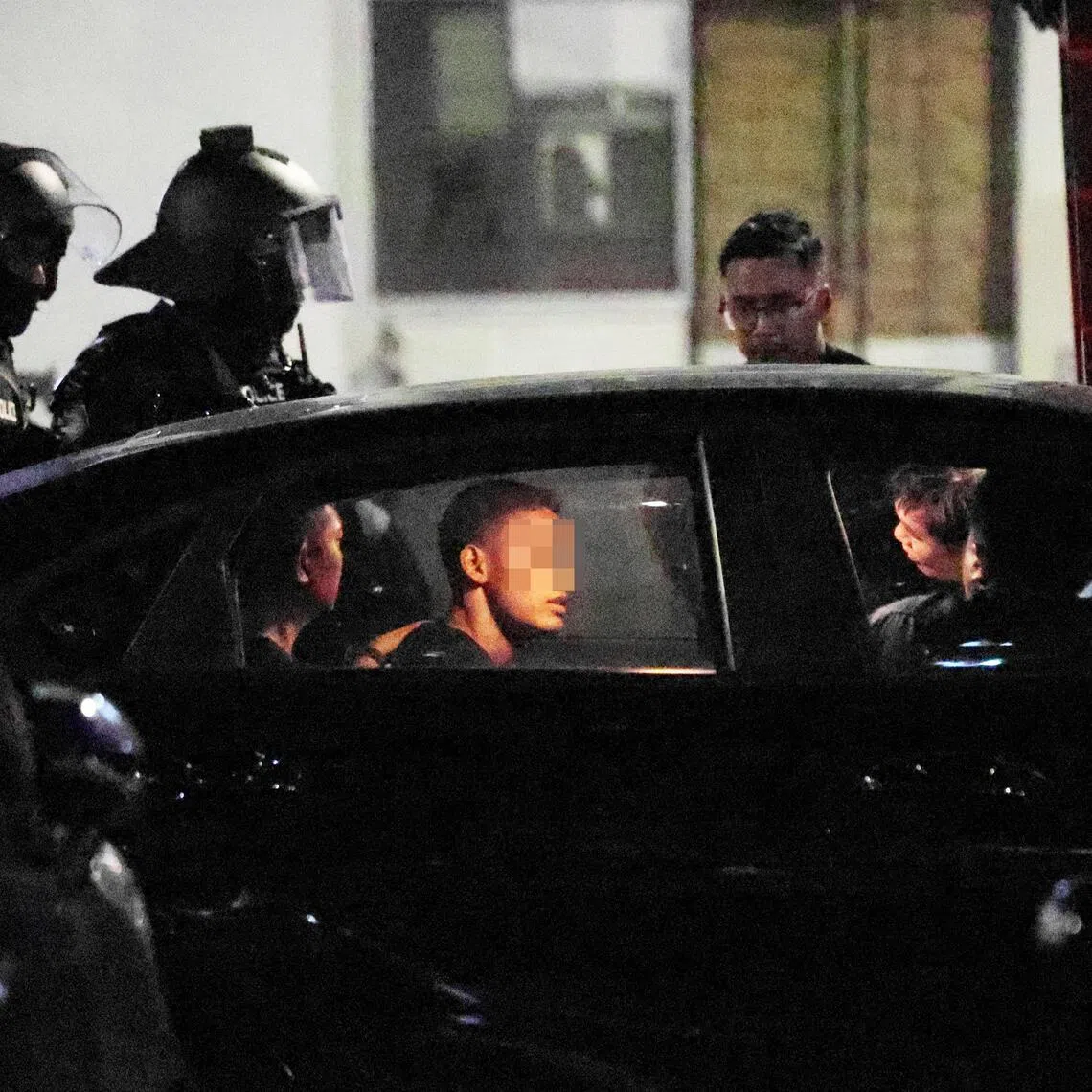 Two men and a woman refused to open the door and locked themselves inside a residential unit at Block 262 Jurong East Street 24.