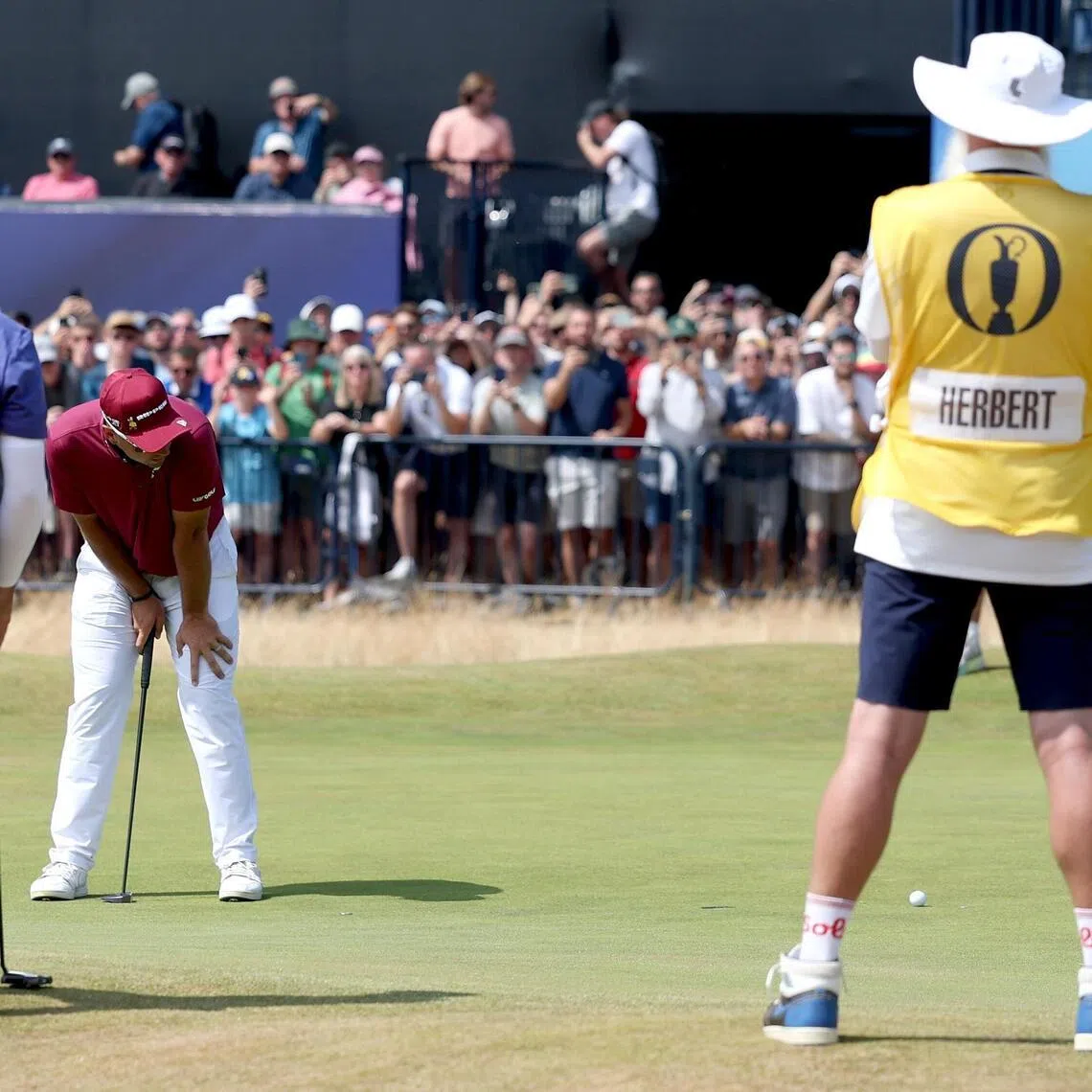 Australia’s Lucas Herbert reacts after missing the par putt on the 18th hole during Round 2 of the British Open on July 17.