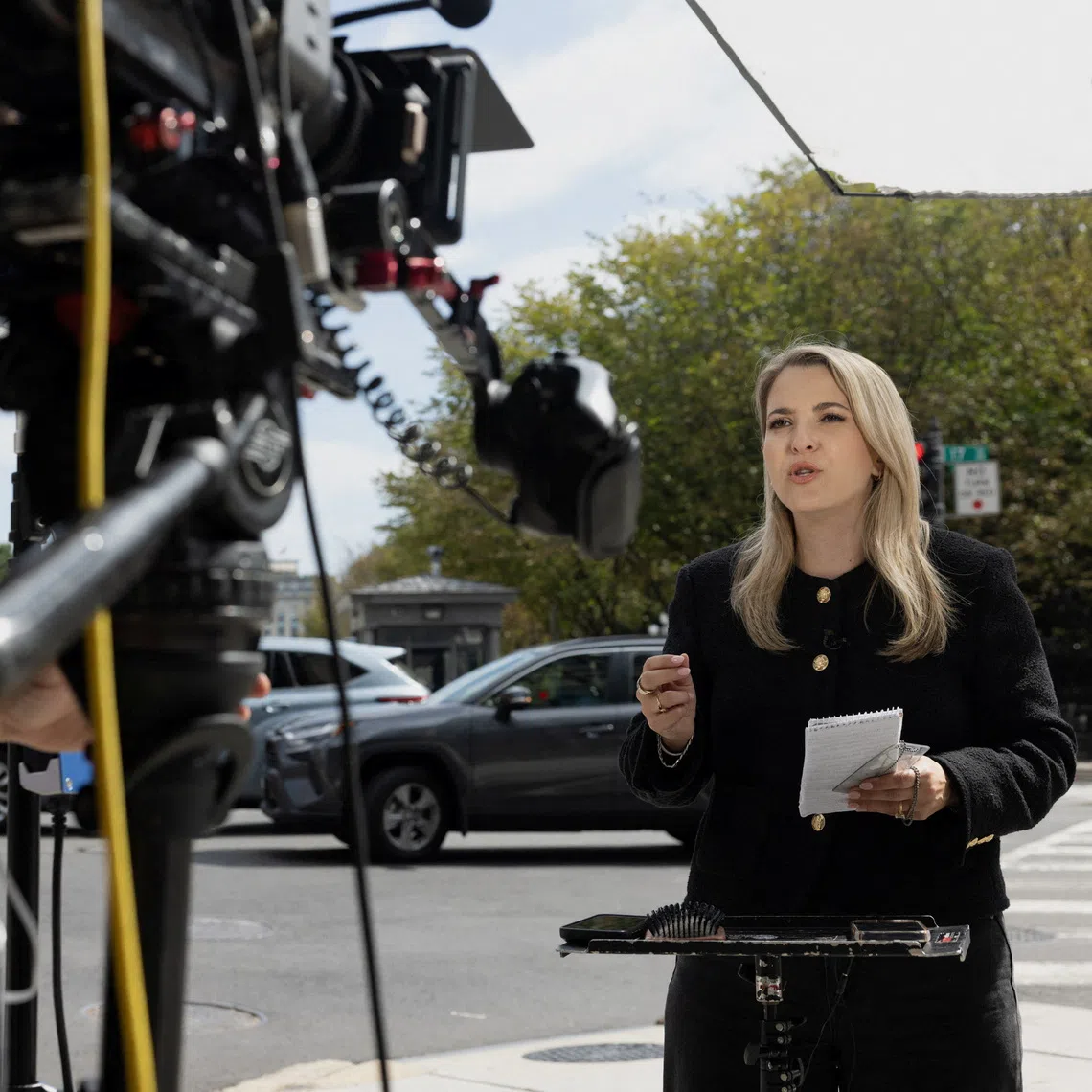 CNN correspondent Betsy Klein reporting outside the White House after US President Donald Trump banned the news outlet from its premises on Sept 19.