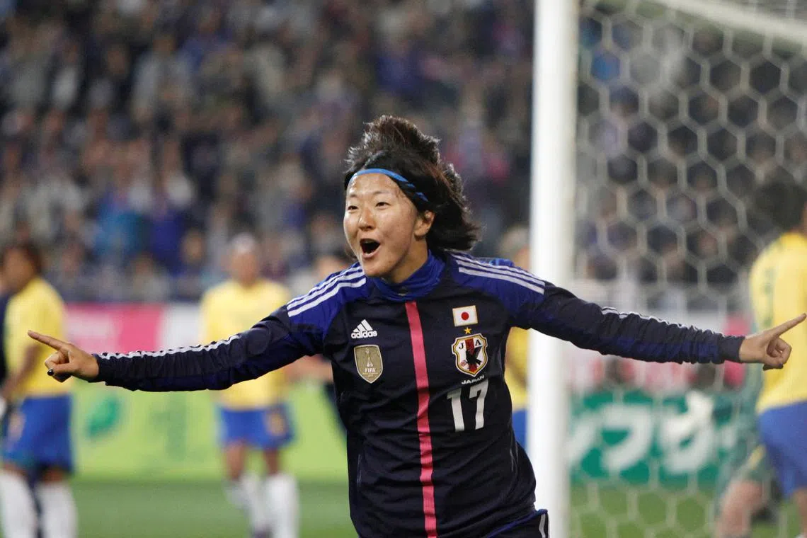 FILE PHOTO: Yuki Nagasato of Japan celebrates her goal against  Brazil during their women's friendly soccer match in Kobe, western Japan, April 5, 2012. REUTERS/Issei Kato/File Photo