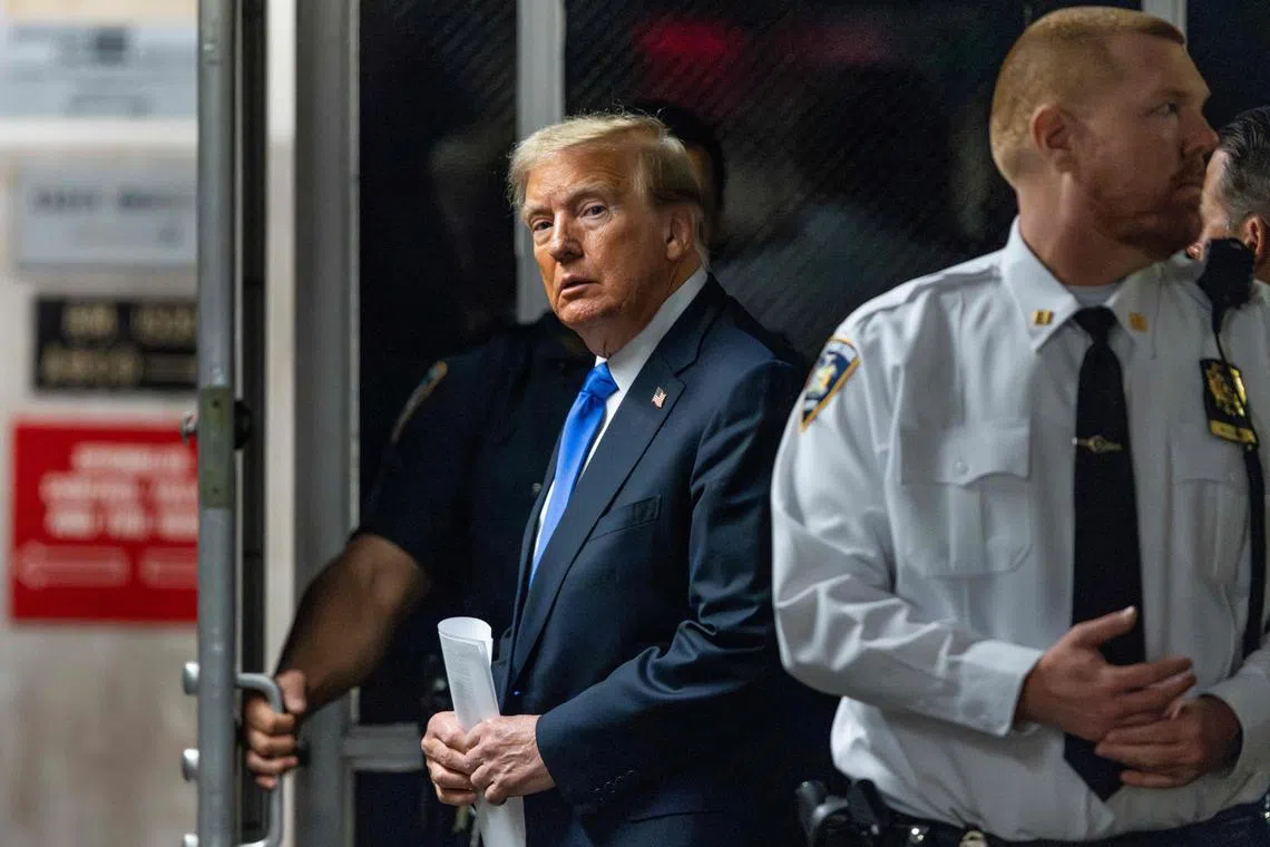 Former US president and Republican presidential candidate Donald Trump exits the courtroom for a break in his criminal trial, on May 30.