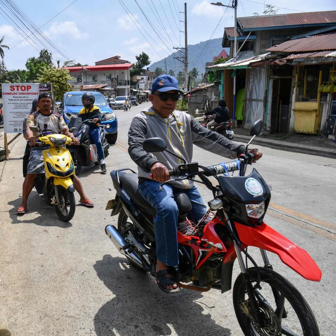 Military personnel from Task Force Marawi stand guard at a checkpoint on the southern island of Mindanao.