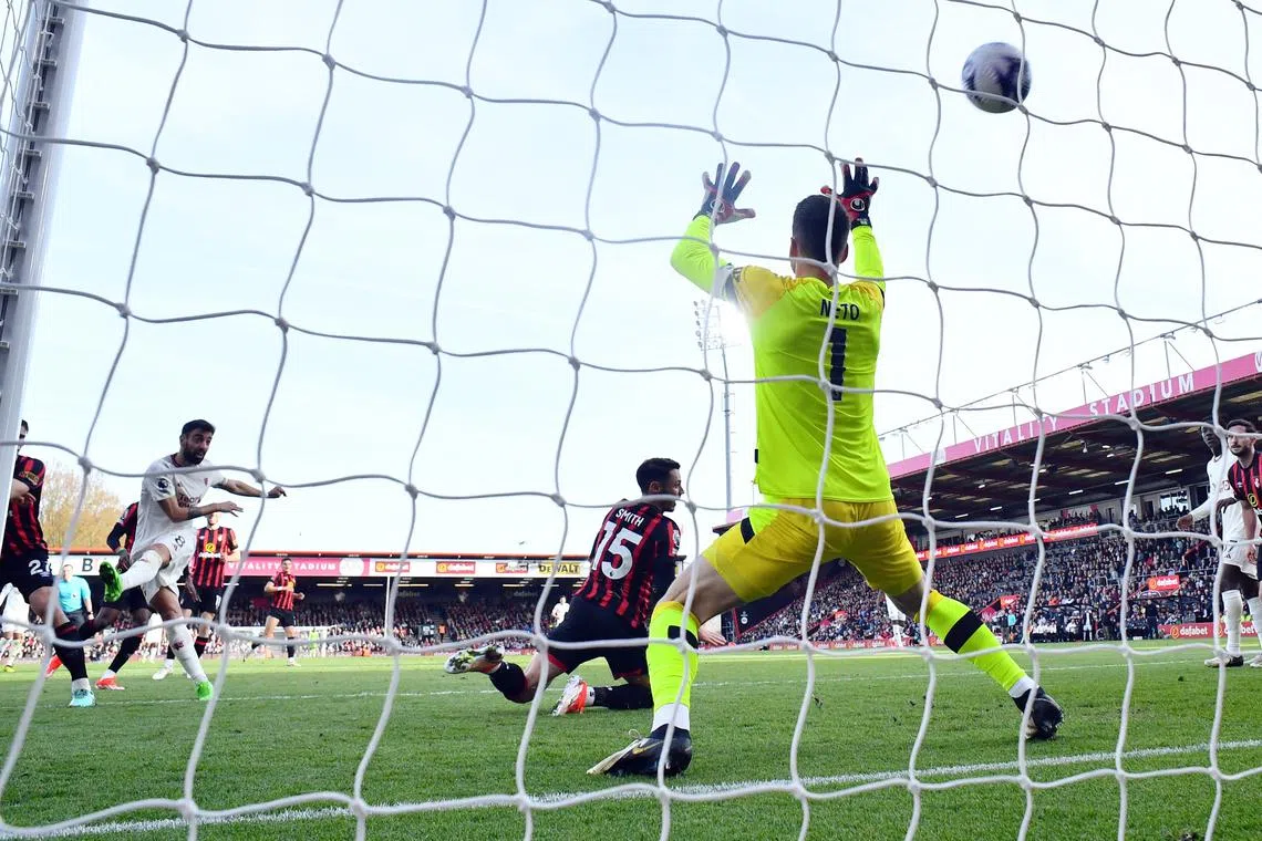 Soccer Football - Premier League - AFC Bournemouth v Manchester United - Vitality Stadium, Bournemouth, Britain - April 13, 2024 Manchester United's Bruno Fernandes scores their first goal REUTERS/Dylan Martinez