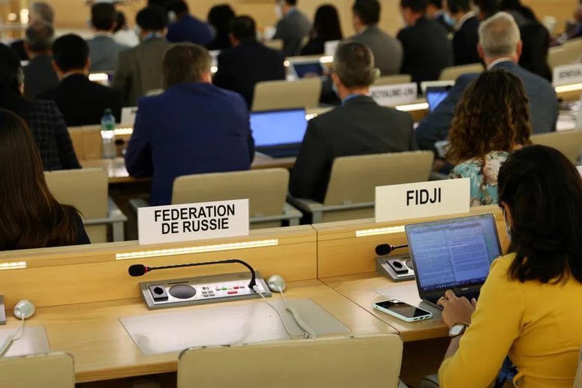 FILE PHOTO: The empty seat for the representative of Russia is pictured during the Human Rights Council special session on the human rights situation in Ukraine, at the United Nations in Geneva, Switzerland, May 12, 2022. REUTERS/Denis Balibouse/File Photo