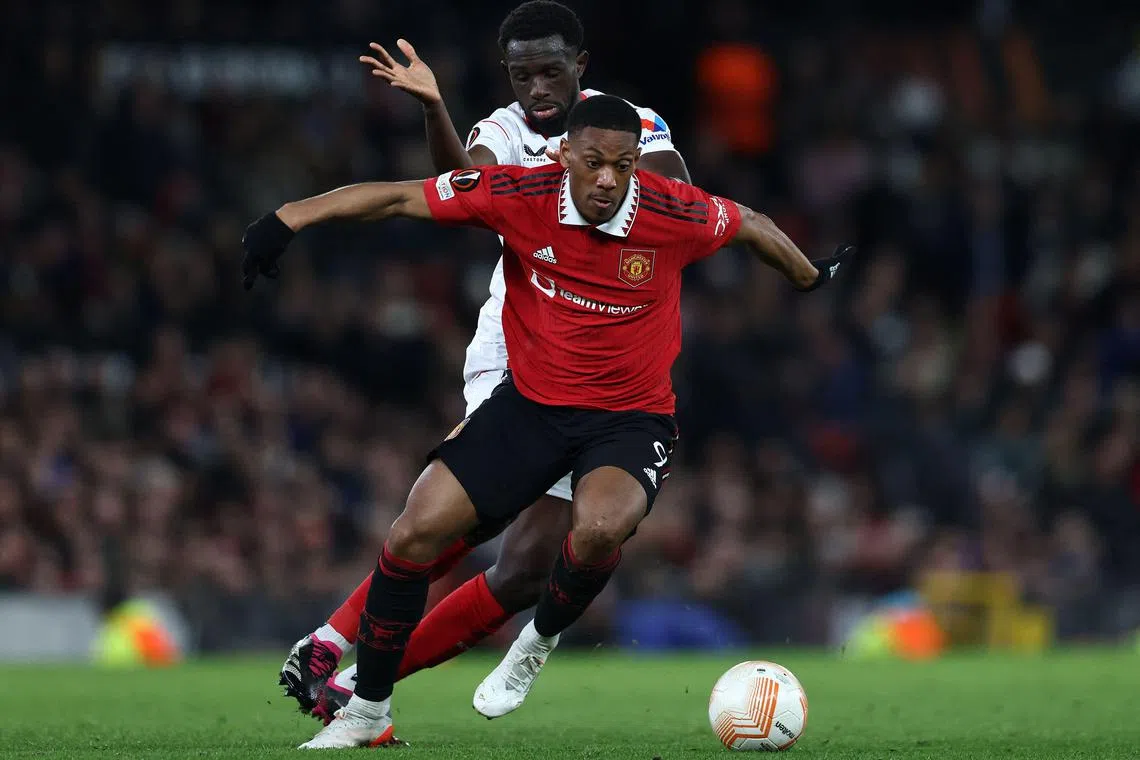 Manchester United's Anthony Martial (right) in action during the UEFA Europa league quarter-final against Sevilla on April 13. 
