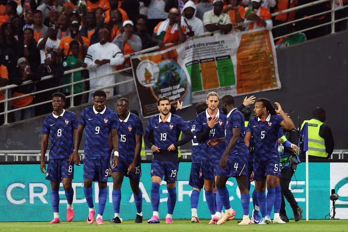 Soccer Football - International Friendly - France v Ivory Coast - The Stade de la Beaujoire - Louis Fonteneau, Nantes, France - June 4, 2026 France's Adrien Rabiot celebrates with teammates after  Rayan Cherki scores their first goal REUTERS/Gonzalo Fuentes
