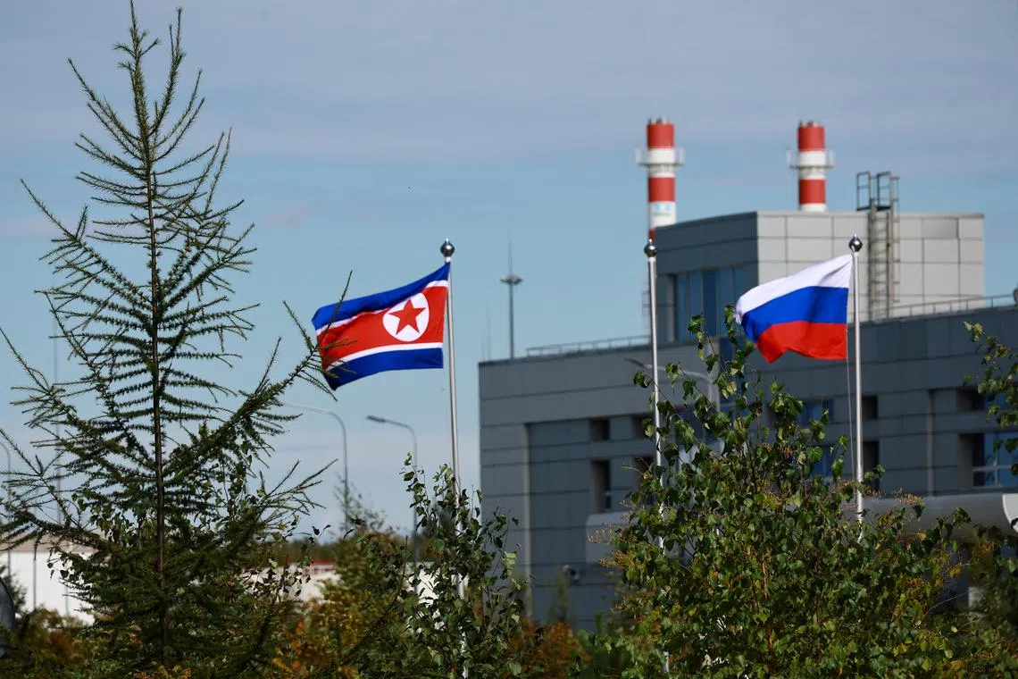 Flags of Russia and North Korea at the Vostochny Сosmodrome in the far eastern Amur region, Russia, on Sept 13.