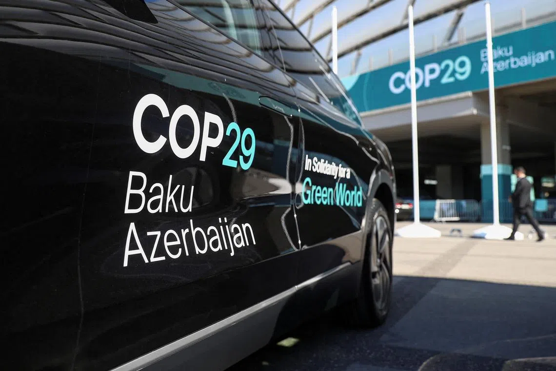 FILE PHOTO: A car is parked at the venue of the United Nations climate change conference, known as COP29, during a media tour ahead of the summit beginning in Baku, Azerbaijan November 8, 2024. REUTERS/Aziz Karimov/File Photo
