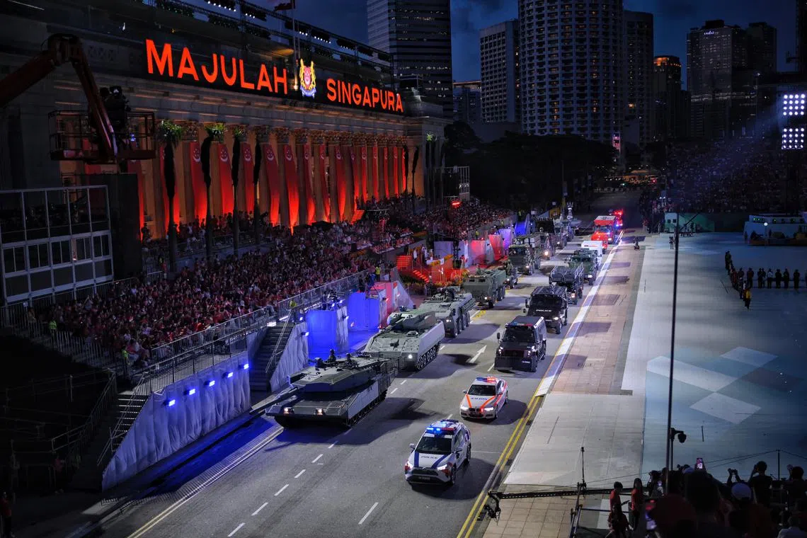 The Total Defence Parade during the National Day Parade at the Padang on Aug 9, 2023. ST PHOTO: MARK CHEONG