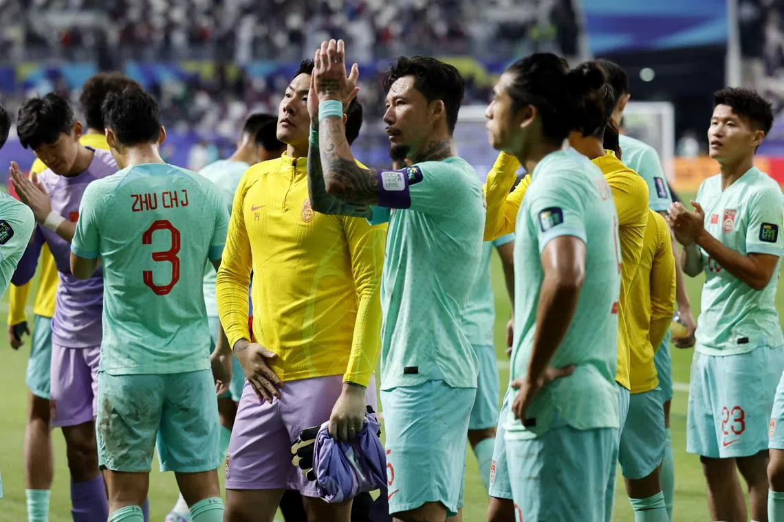 China skipper Zhang Linpeng applauding their fans after a 1-0 defeat by Qatar the Asian Cup in January.