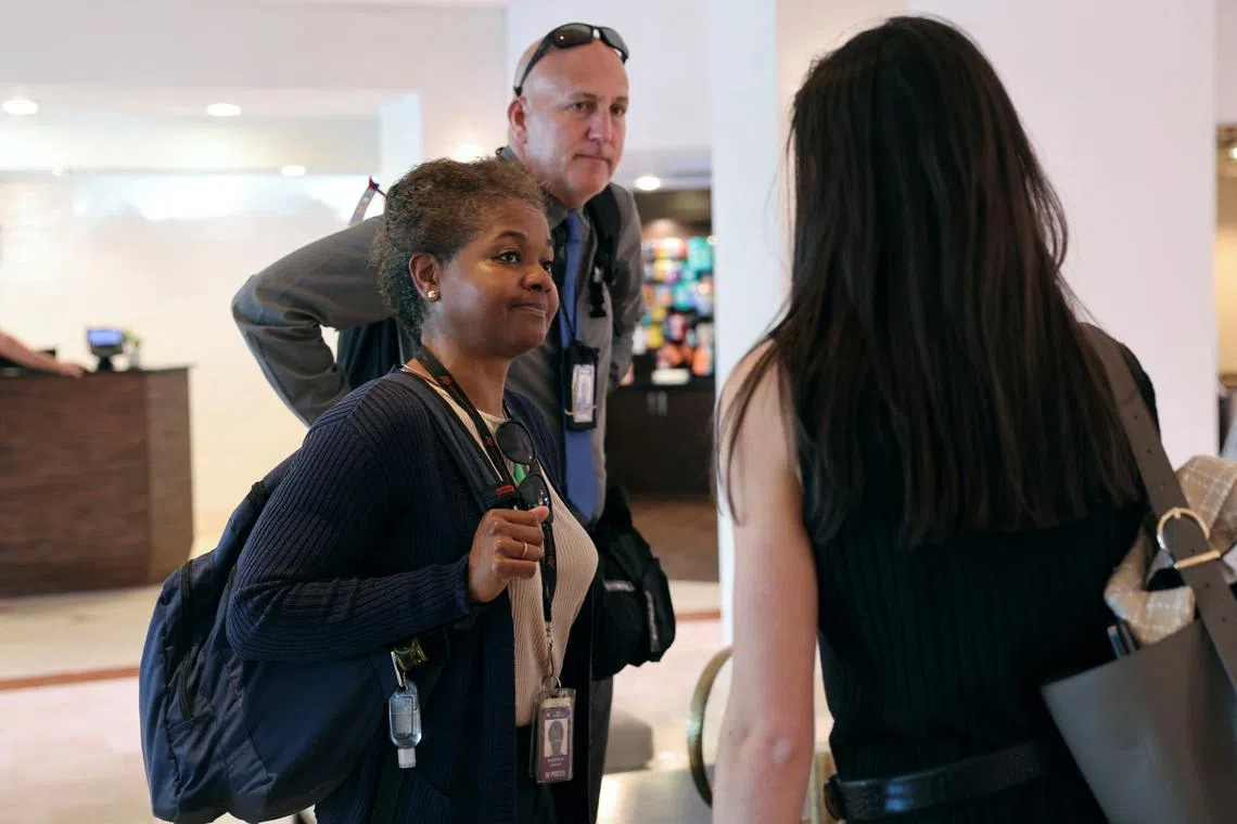 FILE PHOTO: Associated Press White House reporter Darlene Superville and AP photographer Ben Curtis are told by a U.S. President Donald Trump administration member that they have been denied from joining the White House press pool in West Palm Beach, Florida, U.S., February 15,  2025. REUTERS/Kevin Lamarque/File Photo