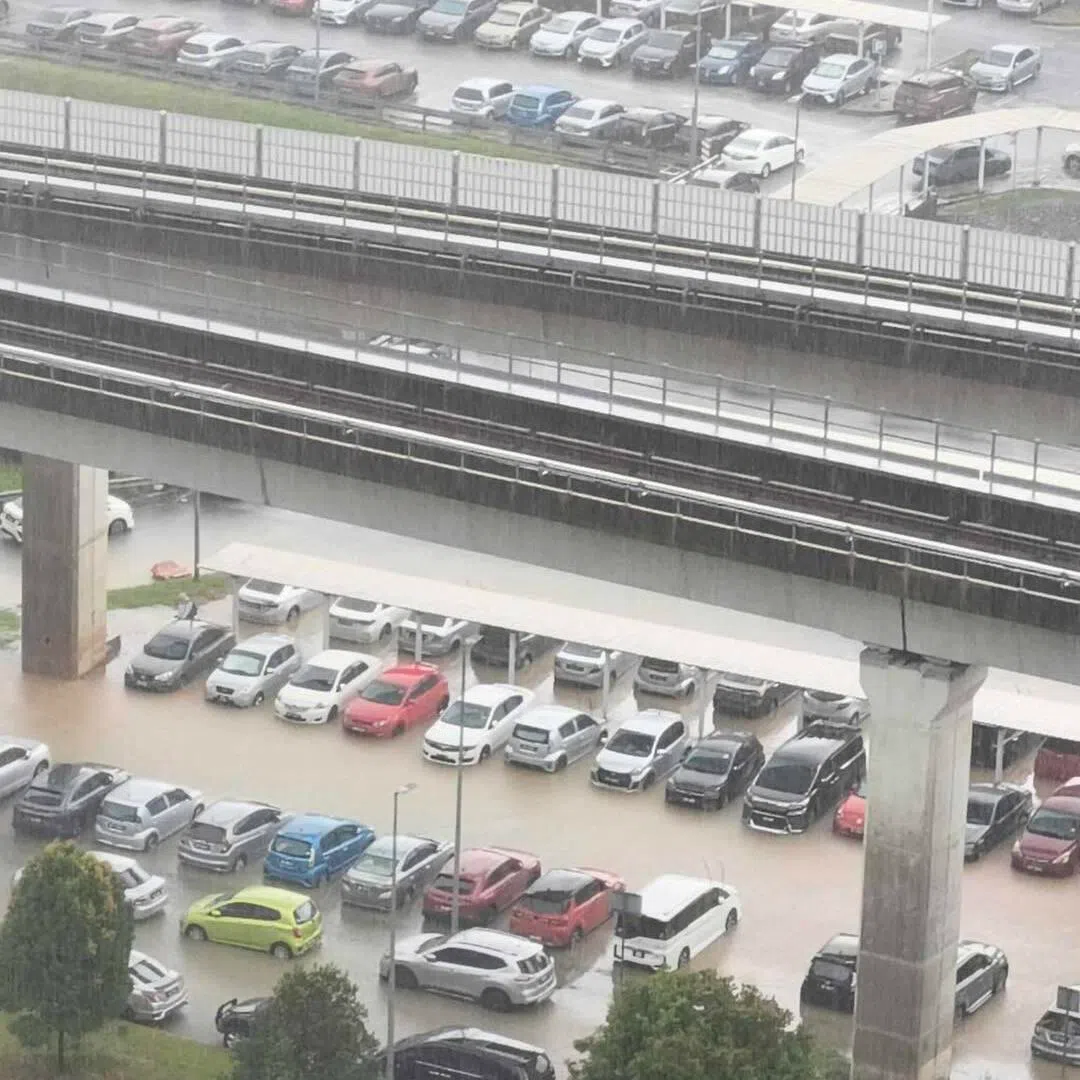 The carpark near the Bukit Jalil LRT flooded after heavy rainfall.