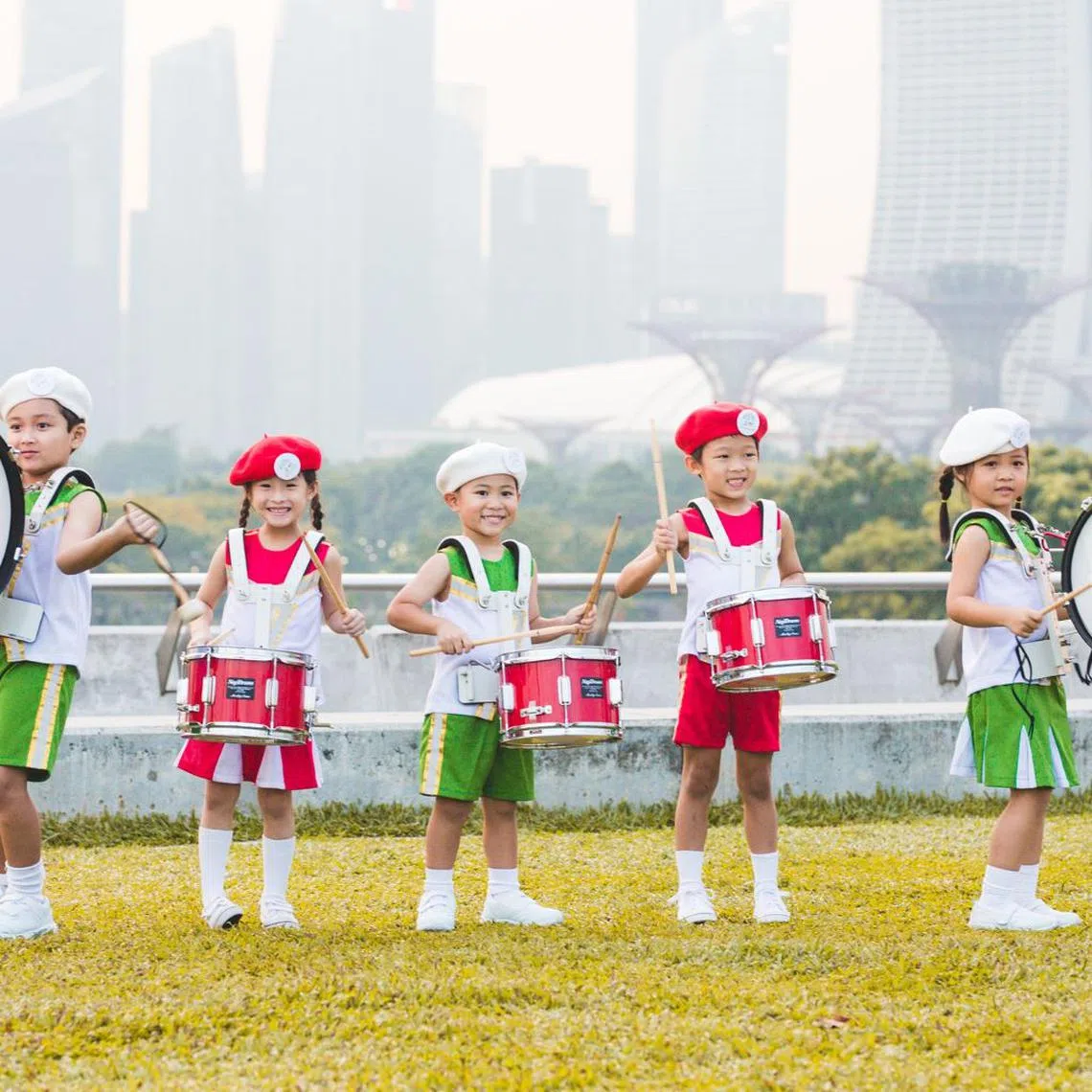 The marching band and stage ensemble regularly perform in public, providing Kinderland children with opportunities to build self-confidence and showcase their talents.