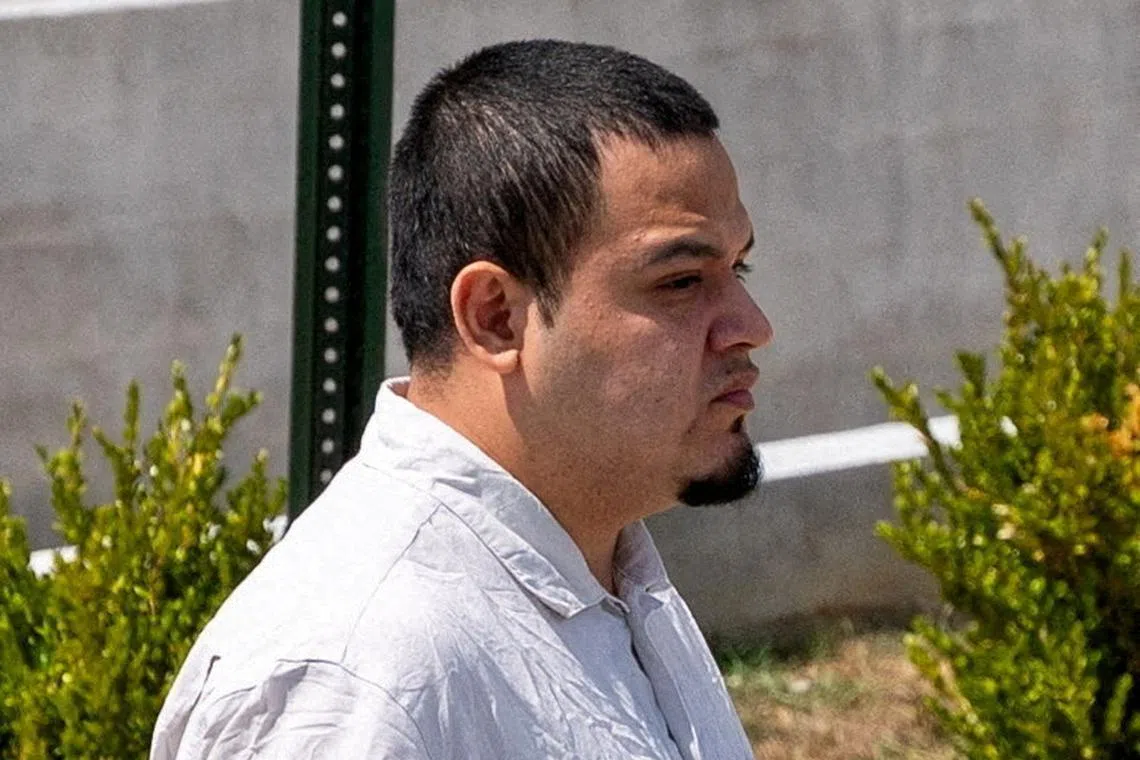 FILE PHOTO: Kilmar Abrego Garcia walks after he has been released from the Putnam County Jail in Cookeville, Tennessee, U.S., August 22, 2025.  REUTERS/Seth Herald/File Photo