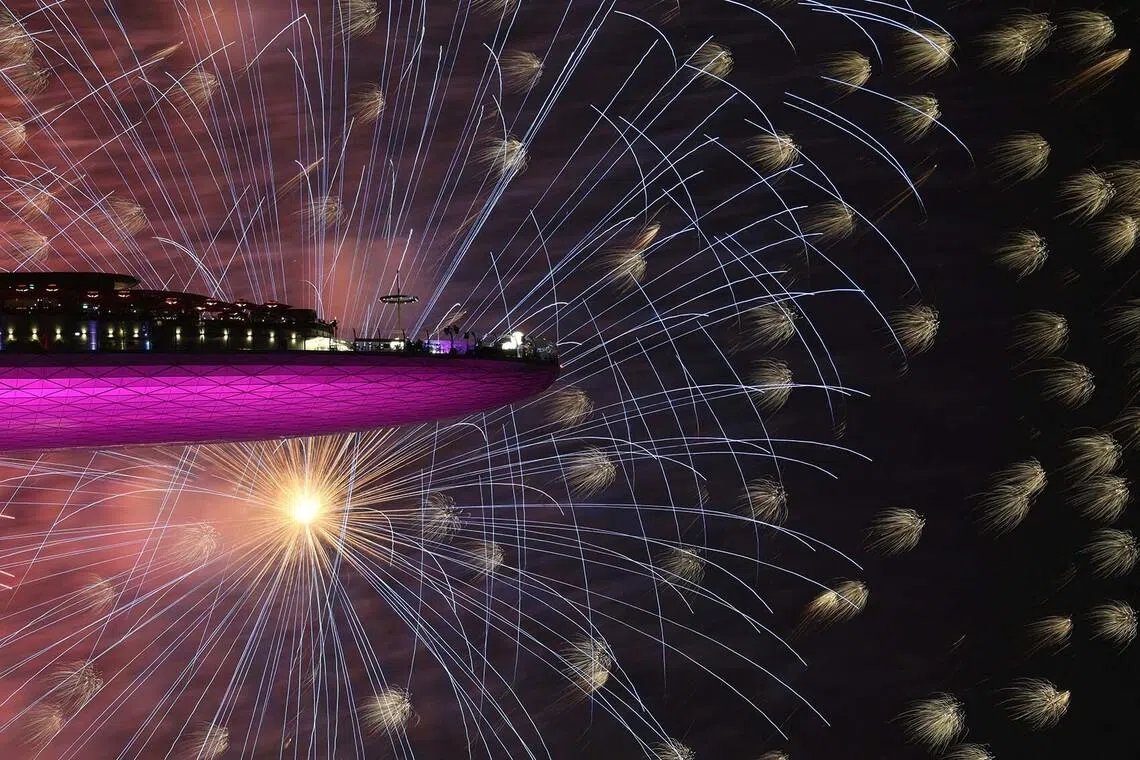 People watching New Year’s Day celebration fireworks from the Marina Bay Sands hotel in Singapore on Jan 1, 2026. 
