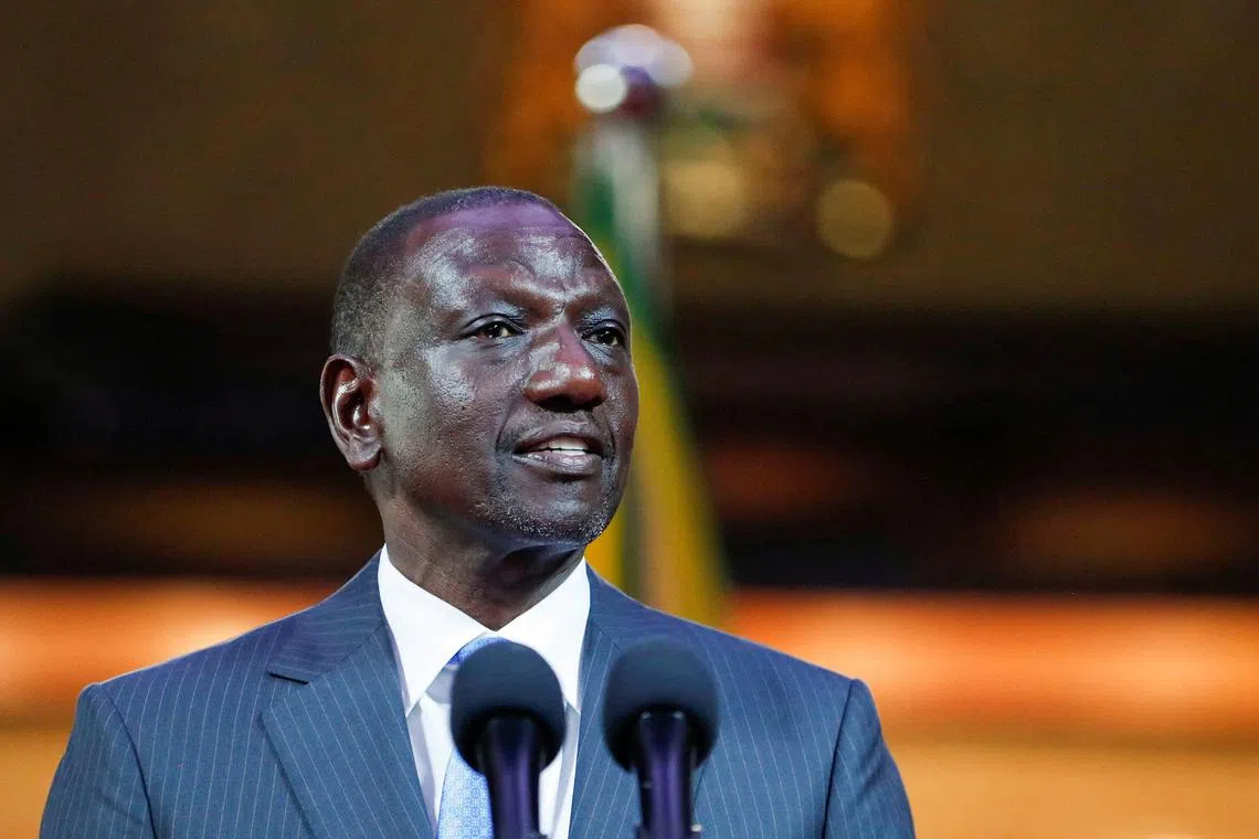 FILE PHOTO: Kenya's President William Ruto addresses delegates after signing the Independent Electoral and Boundaries Commission Amendment Bill 2024, backed by the National Dialogue Committee (NADCO), at the Kenyatta International Conference Centre in Nairobi, Kenya July 9, 2024. REUTERS/Thomas Mukoya/File Photo