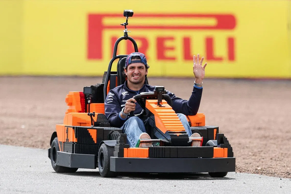 Formula One F1 - British Grand Prix - Silverstone Circuit, Silverstone, Britain - July 5, 2026 Williams' Carlos Sainz Jr. in a car made of Lego blocks ahead of the race REUTERS/Andrew Boyers