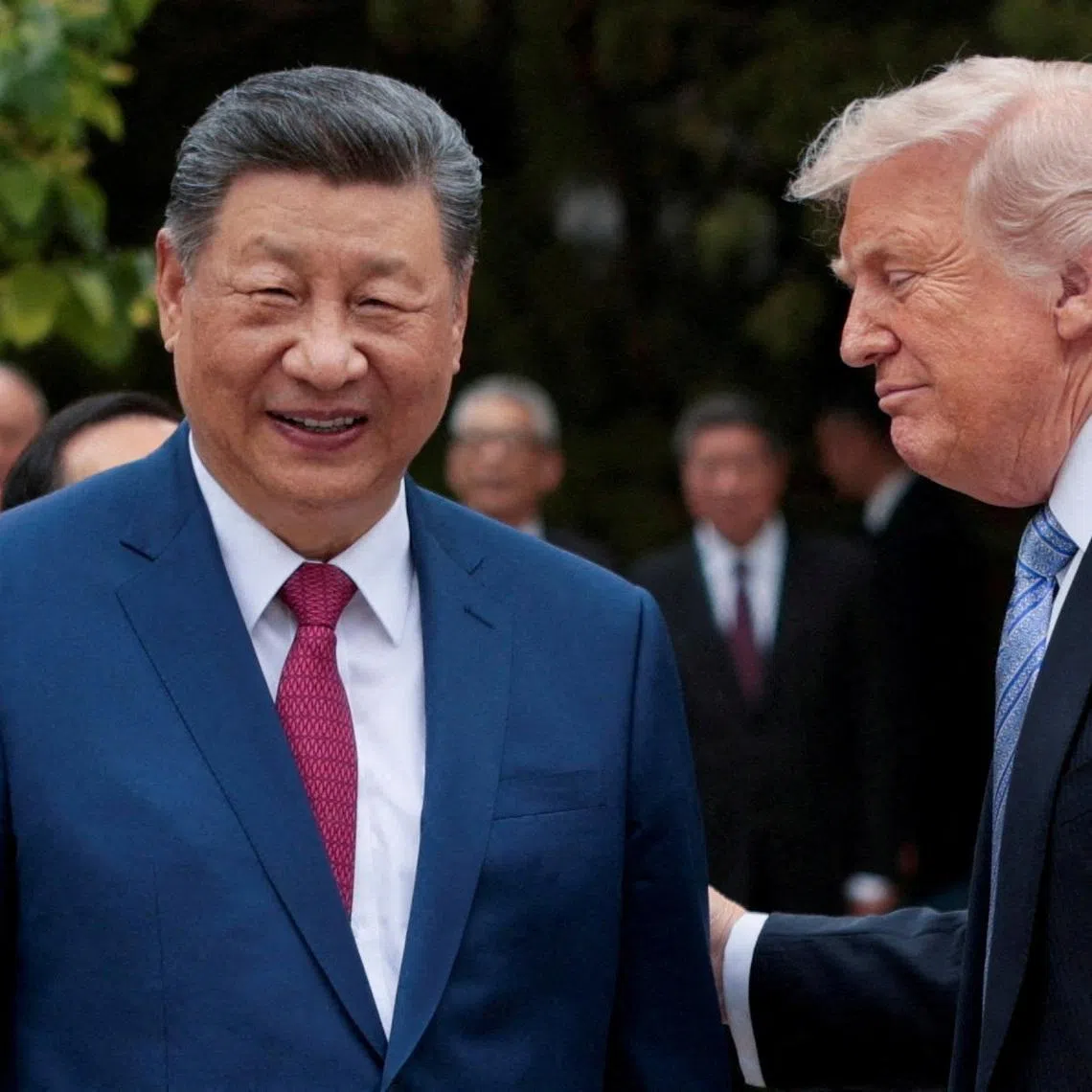 US President Donald Trump speaking with Chinese President Xi Jinping while leaving after a visit to the Zhongnanhai Garden in Beijing, China, on May 15.