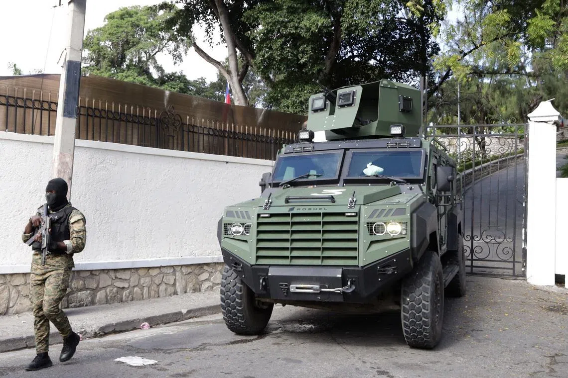 FILE PHOTO: Haitian security forces guard the Prime Minister's office and the headquarters of the Transitional Presidential Council (CPT), as the mandate of the transitional governing council, formed to curb gang violence and pave the way for long-delayed election, is set to end on February 7 with no succession plan in place, in Port-au-Prince, Haiti, February 6, 2026. REUTERS/Egeder Pq Fildor/File Photo
