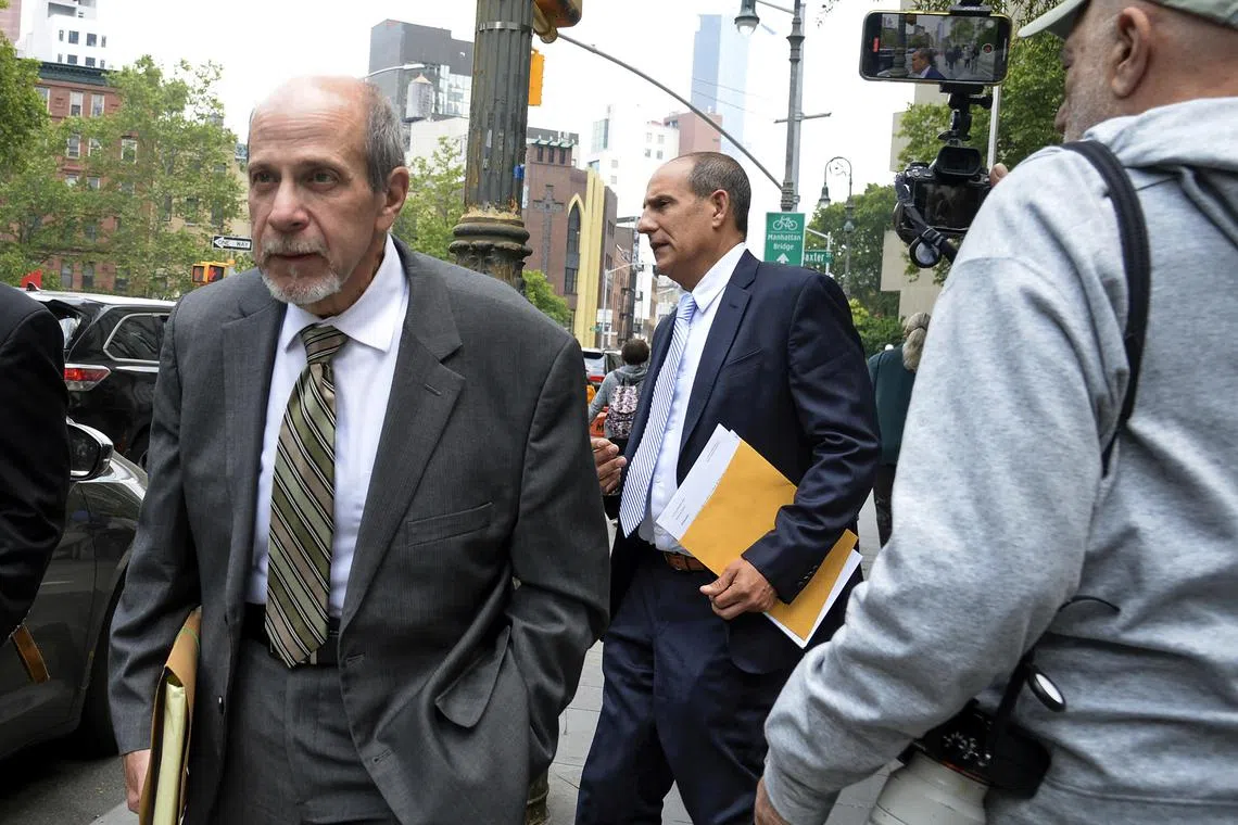 Lawyers Peter LoDuca (left) and Steven Schwartz leaving the Federal District Court in Manhattan, on June 8. 