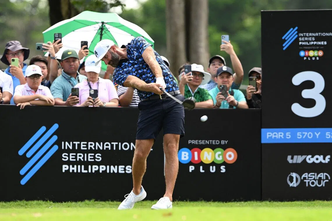 Dustin Johnson of the US tees during the International Series Philippines at Sta Elena Golf Club in Santa Rosa town.