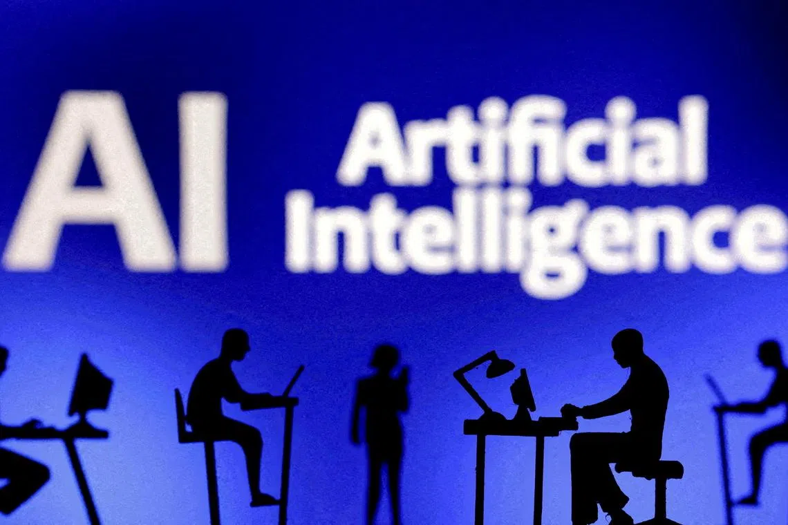 FILE PHOTO: Figurines with computers and smartphones are seen in front of the words "Artificial Intelligence AI" in this illustration taken, February 19, 2024. REUTERS/Dado Ruvic/Illustration/File Photo