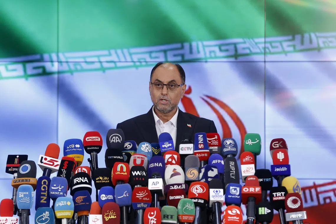 epa11383313 Senior official of Iranian supreme leader office Vahid Haghanian speaks to the media after registering his candidacy for the Iranian presidential election at the Interior Ministry in Tehran, Iran, 01 June 2024. Iran will hold presidential election on 28 June 2024.  EPA-EFE/ABEDIN TAHERKENAREH