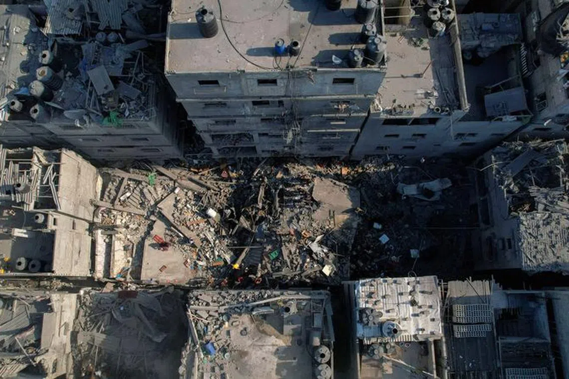 A view shows the ruins of a Palestinian house hit by Israeli strikes at al-Shati (Beach) refugee camp, in Gaza City, October 12, 2023. REUTERS/Mohammed Fayq Abu Mostafa