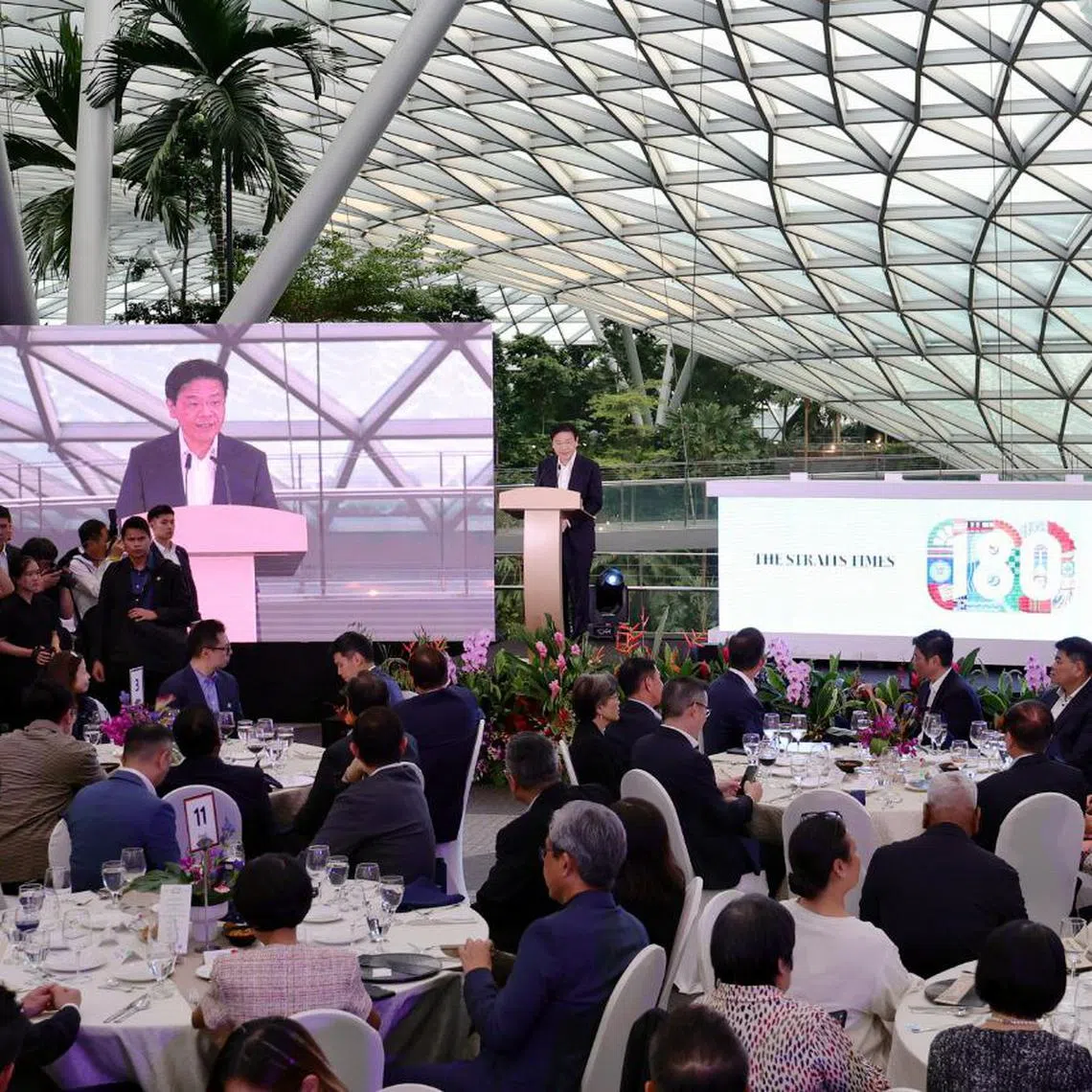 PM Lawrence Wong speaking at a gala dinner to commemorate The Straits Times’ 180th anniversary on July 11.