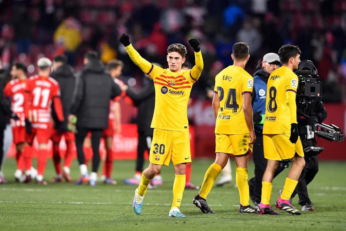 Barcelona's Gavi celebrates at the end of the La Liga match against Girona on Jan 28, 2023. 