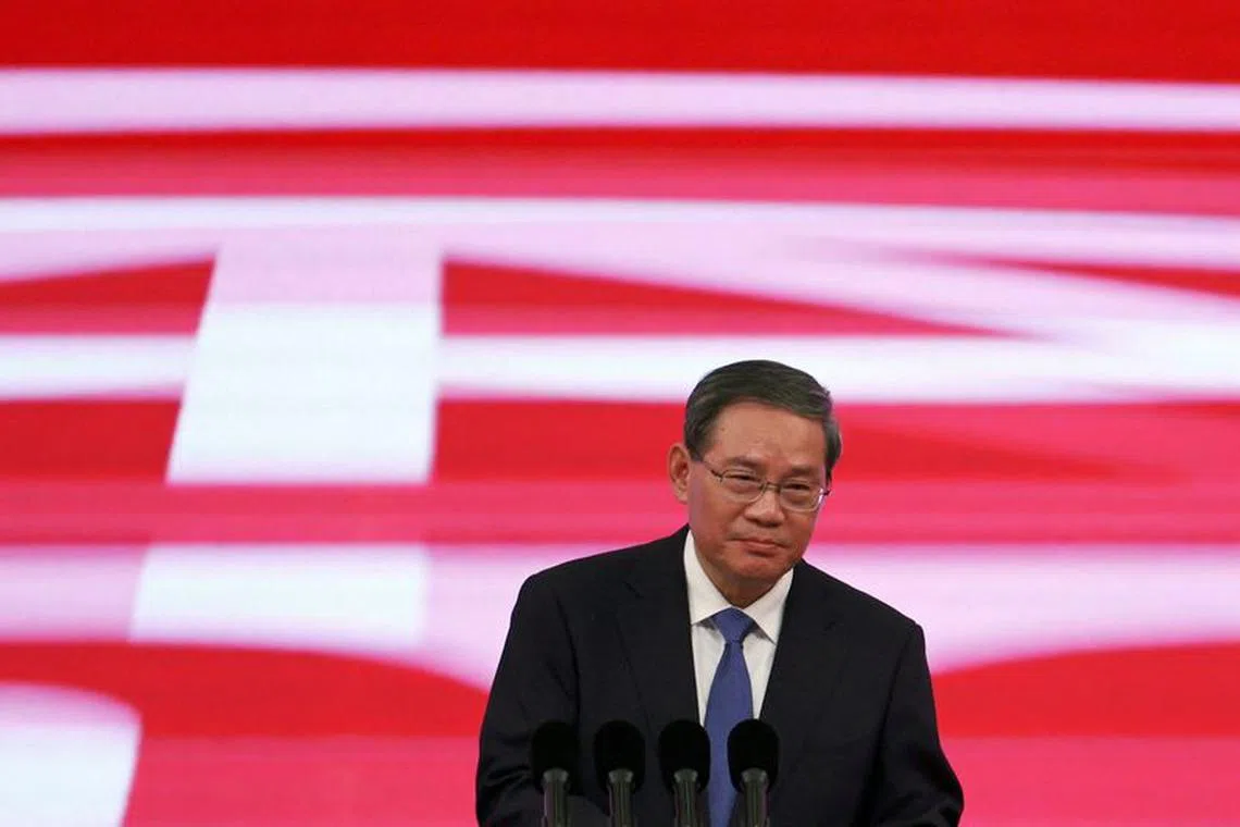 FILE PHOTO: Chinese Premier Li Qiang delivers the keynote speech at the opening ceremony of the first China International Supply Chain Expo (CISCE) in Beijing, China November 28, 2023. REUTERS/Florence Lo/File Photo