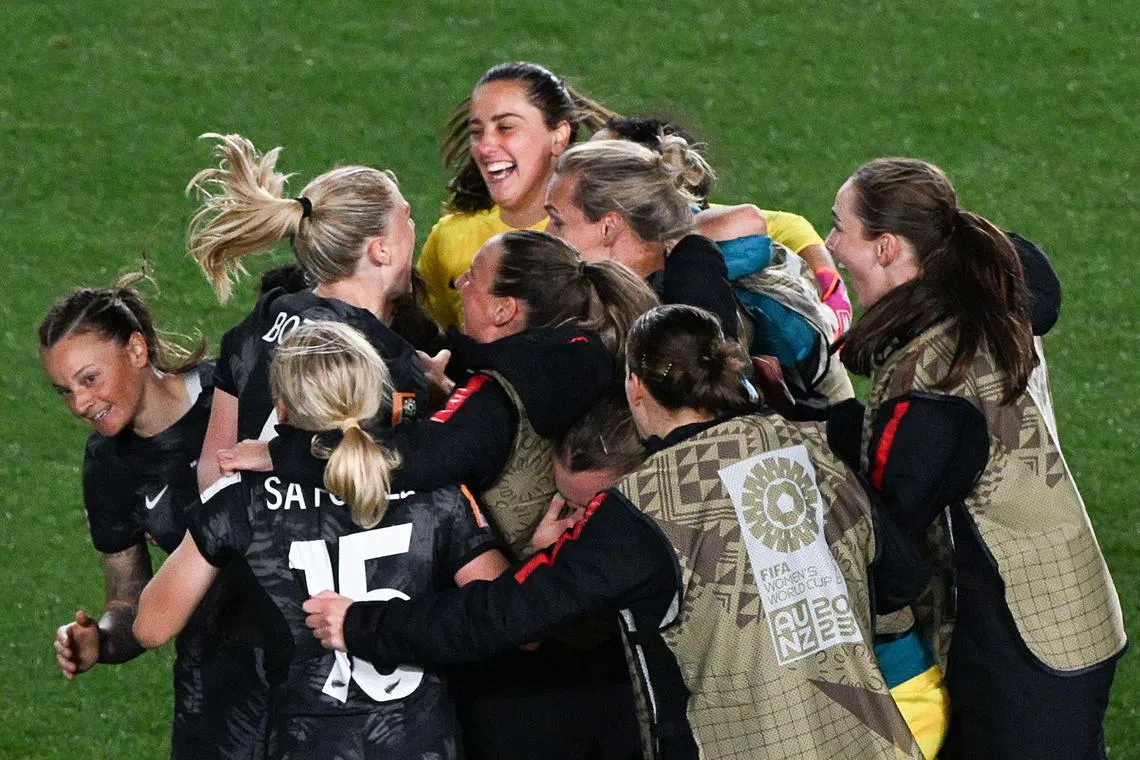 New Zealand's players celebrate after winning the 2023 Women's World Cup Group A football match between against Norway at Eden Park in Auckland last Thursday.