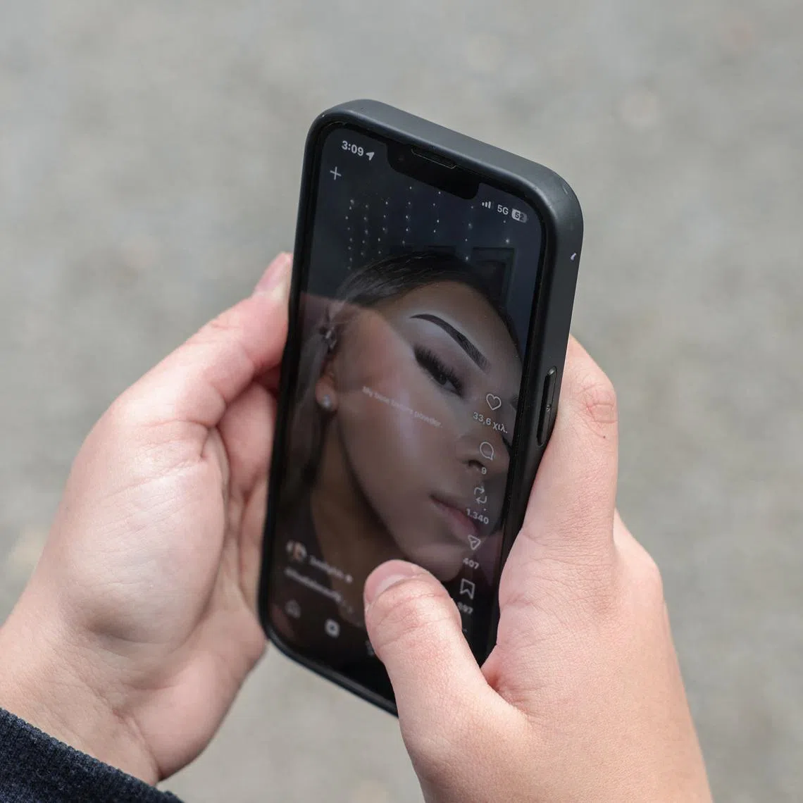 A 14-year-old checks social media posts, as Greece is set to ban under-15s from social media in European crackdown, in Athens, Greece, February 26, 2026. REUTERS/Louisa Gouliamaki