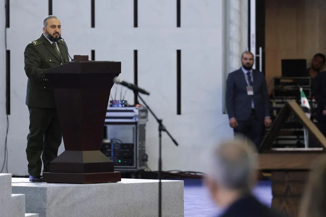 Newly appointed Minister of Defence Murhaf Abu Qasra speaks during a Ministerial formation of the government of the Syrian Arab Republic, in Damascus, Syria March 29, 2025. REUTERS/Khalil Ashawi/File Photo