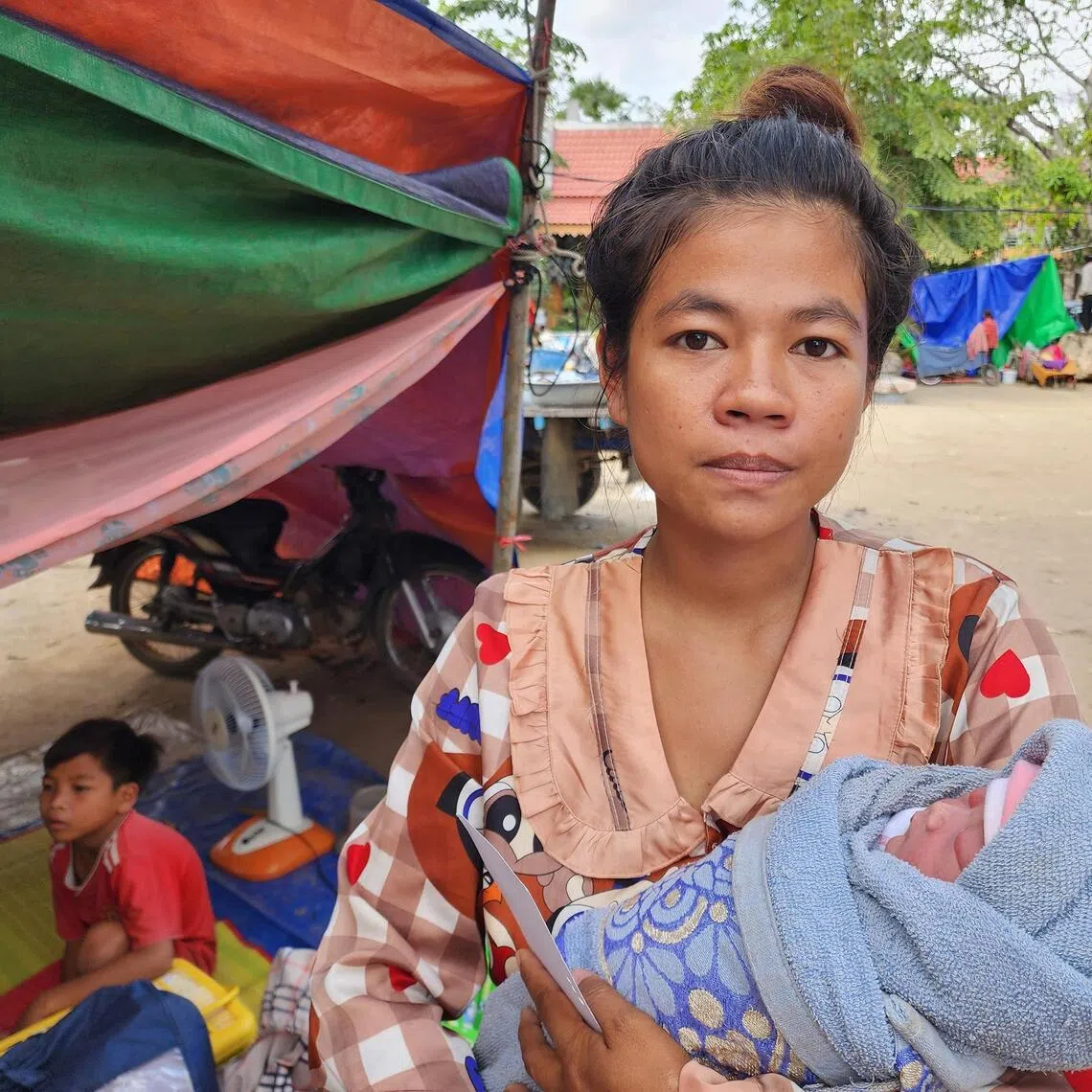 mwchild - 27-yr-old mother Sao Sopha who delivered her daughter on Dec 11 after she had fled to a relief displacement site. ST PHOTO: MAY WONG