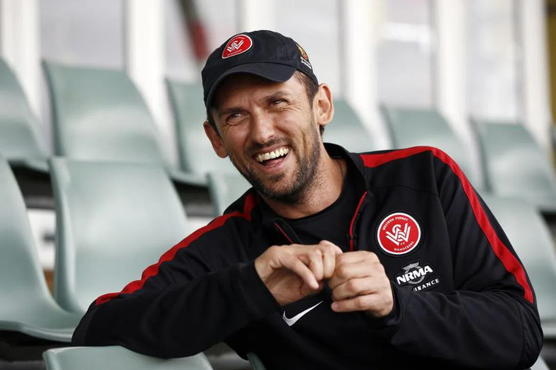Western Sydney Wanderers soccer team coach Tony Popovic laughs at the team's training facility at Rooty Hill in the western suburbs of Sydney, /October 21, 2014.  REUTERS/Jason Reed/File Photo
