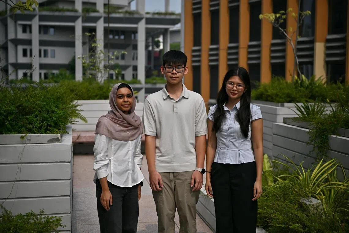 Temasek Polytechnic students Ifra Farveen Mohamad (left), Jude Quek Xian Yang (centre) and Ramiro Althea Mae Bathan (right) participated in the job taster session hosted by GovTech on Sept 4.