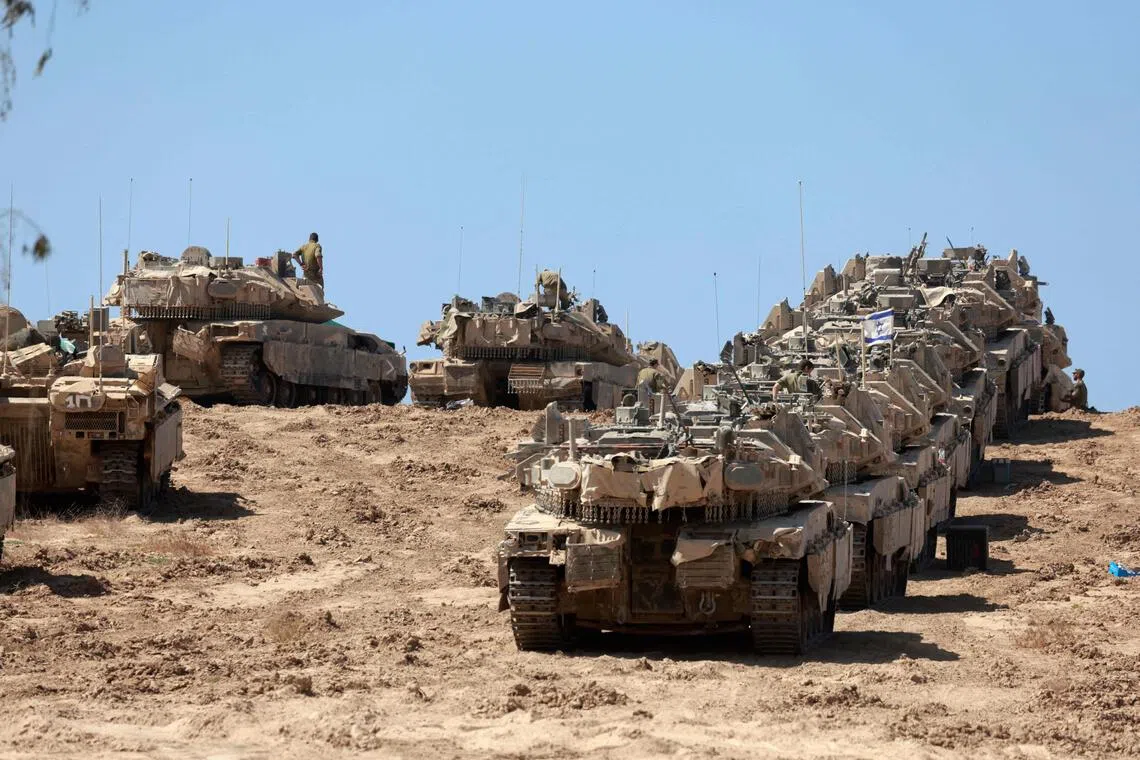 A convoy of Israeli tanks is deployed at Israel's border with the Gaza Strip on Sept 16.