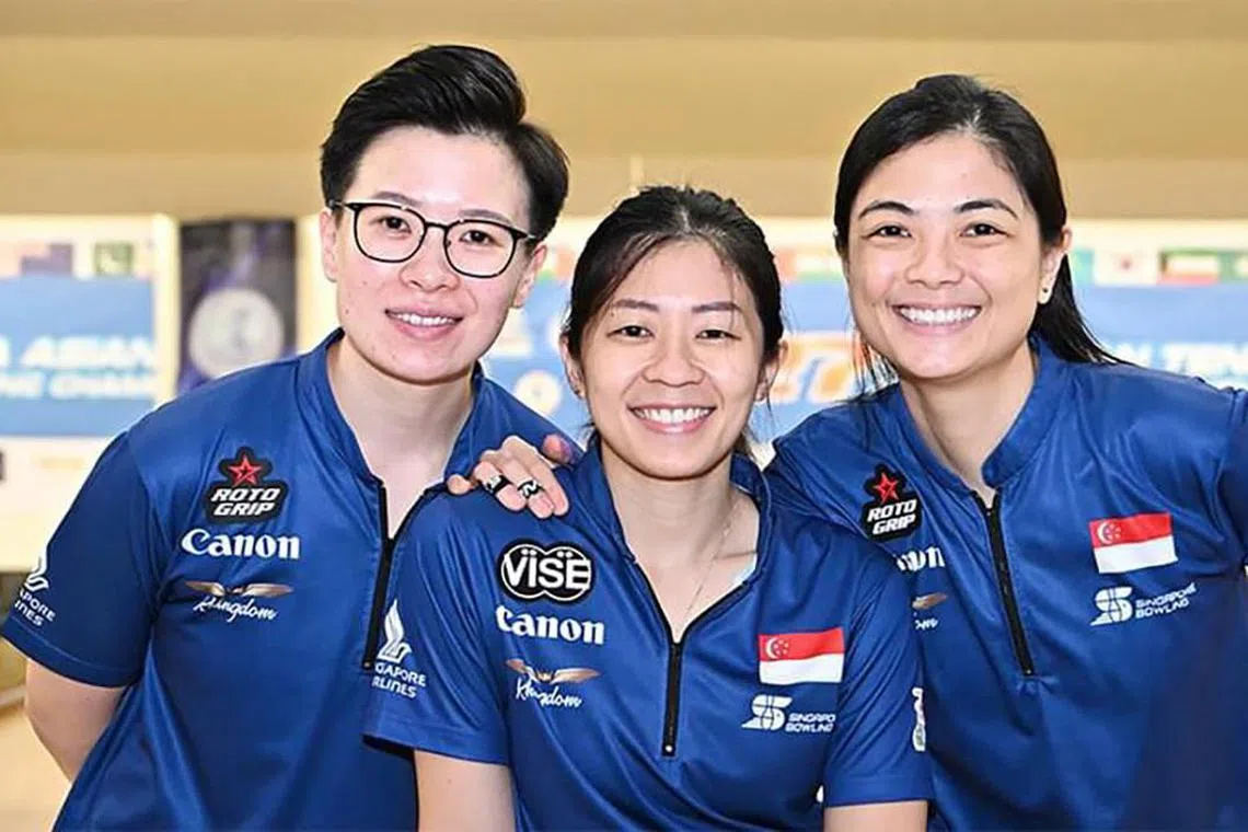 Singapore bowlers (from left) New Hui Fen, Bernice Lim and Daphne Tan came from behind to secure the women's trio gold.