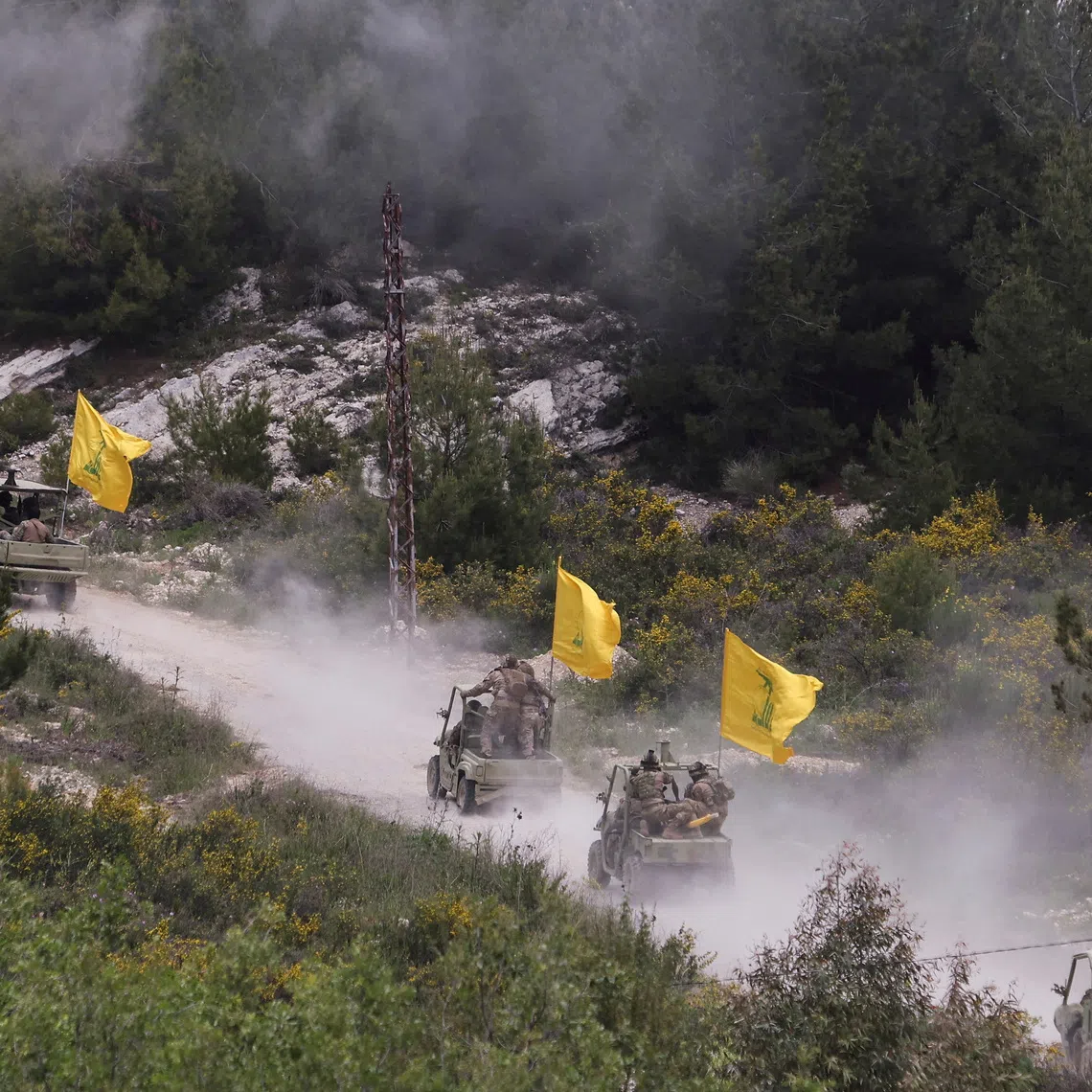 Hezbollah members take part in a military exercise during a media tour organized for the occasion of Resistance and Liberation Day, in Aaramta, Lebanon. REUTERS/Aziz Taher/File photo