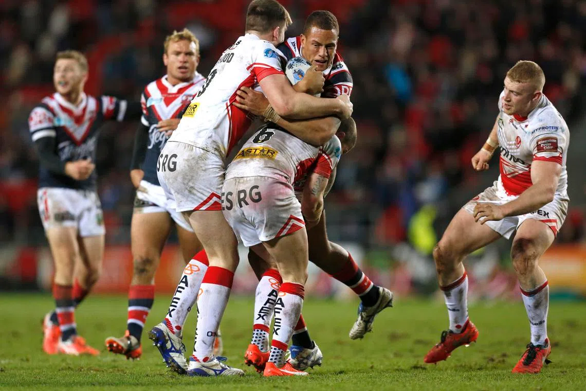 Rugby League - St Helens v Sydney Roosters - 2016 Dacia World Club Series - Langtree Park - 19/2/16 Kane Evans of Sydney Roosters (C) in action. Mandatory Credit: Action Images / Ed Sykes Livepic