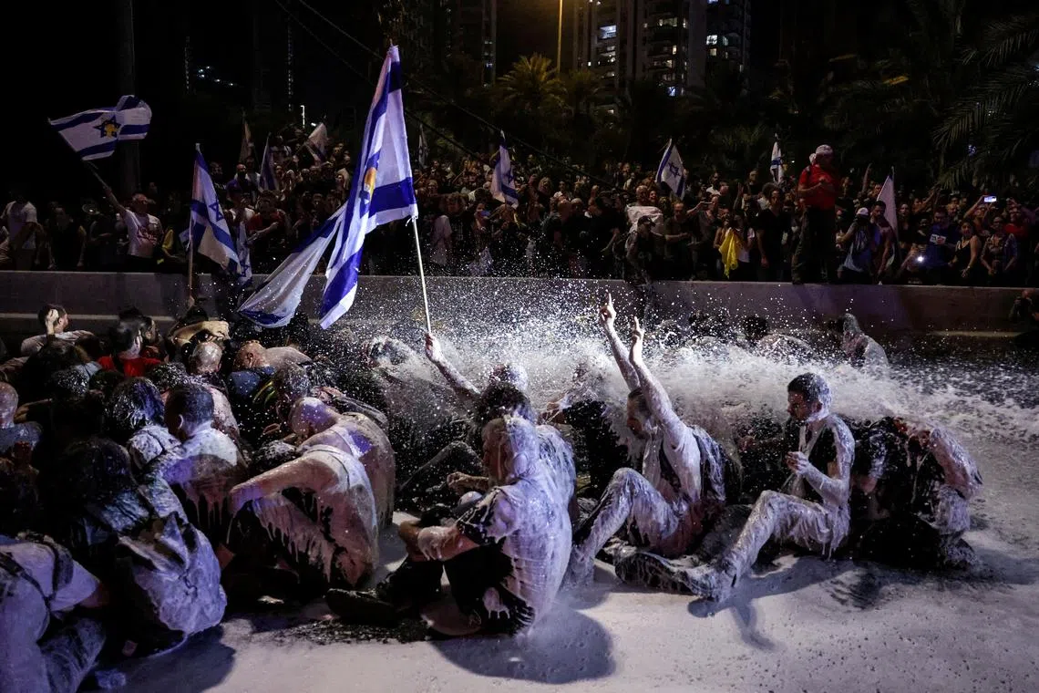 Police use water cannon during a rally to show support for the hostages who were kidnapped during the deadly October 7 attack, amid the ongoing conflict in Gaza between Israel and Hamas, in Tel Aviv, Israel Sept 1, 2024. 