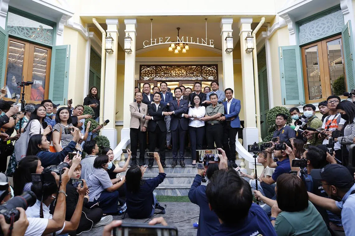 (Front row, left to right) Prachachat Party leader Wan Muhamad Noor Matha, Pheu Thai Party leader Cholnan Srikaew, Move Forward Party leader Pita Limjaroenrat, Thai Srang Thai Party leader Sudarat Keyuraphan, Seri Ruam Thai Party leader Sereepisut Temeeywet and Thamham Party leader Pitipong Temcharoen pose for photos after they meeting in Bangkok, Thailand, May 17. Move Forward Party and five other political parties announced they will form a coalition government after leading the nationwide vote count in the general election over the allies of conservative and military-backed parties which took power since 2014. 