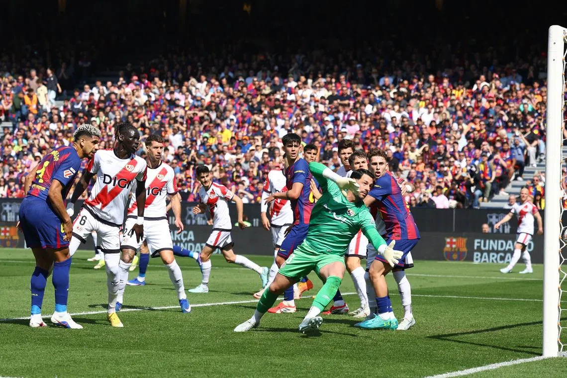 Soccer Football - LaLiga - FC Barcelona v Rayo Vallecano - Spotify Camp Nou, Barcelona, Spain - March 22, 2026 FC Barcelona's Ronald Araujo scores their first goal REUTERS/Albert Gea