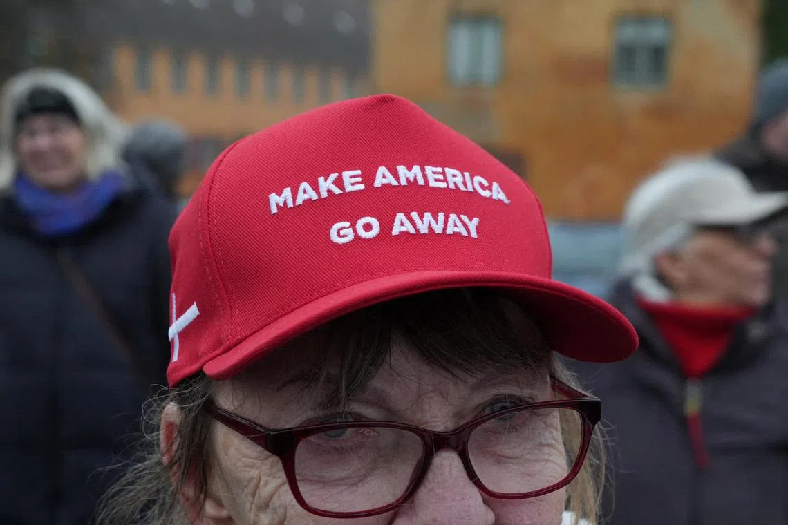 A protester takes part in a demonstration to show support for Greenland in Copenhagen, Denmark January 17. REUTERS/Tom Little