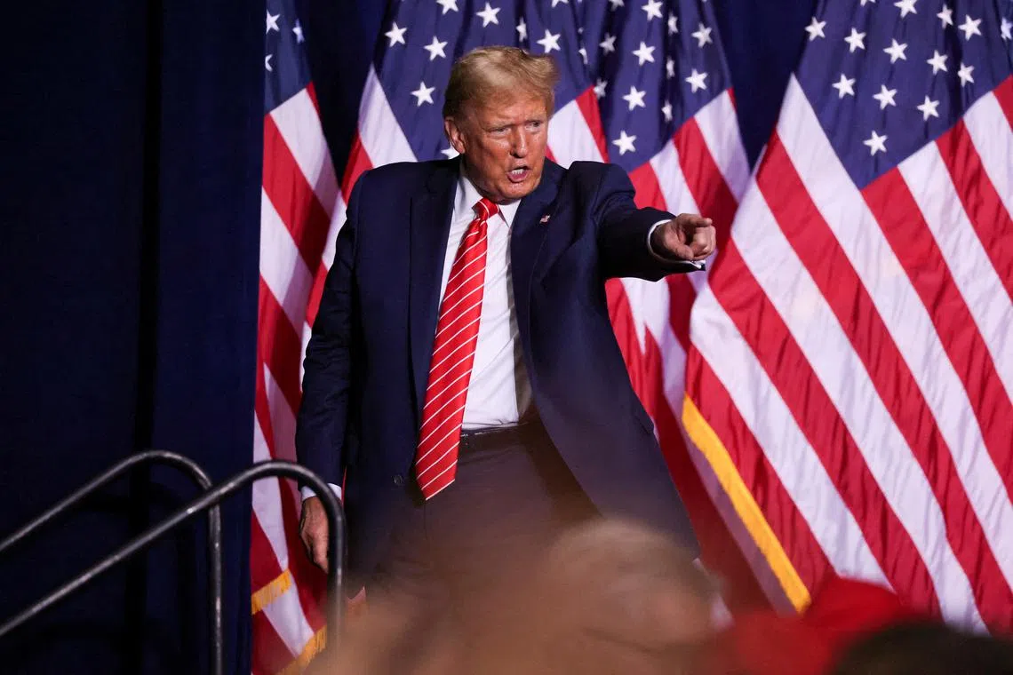 FILE PHOTO: Republican presidential candidate and former U.S. President Donald Trump reacts during a campaign rally at the Forum River Center in Rome, Georgia, U.S. March 9, 2024. REUTERS/Alyssa Pointer/File Photo