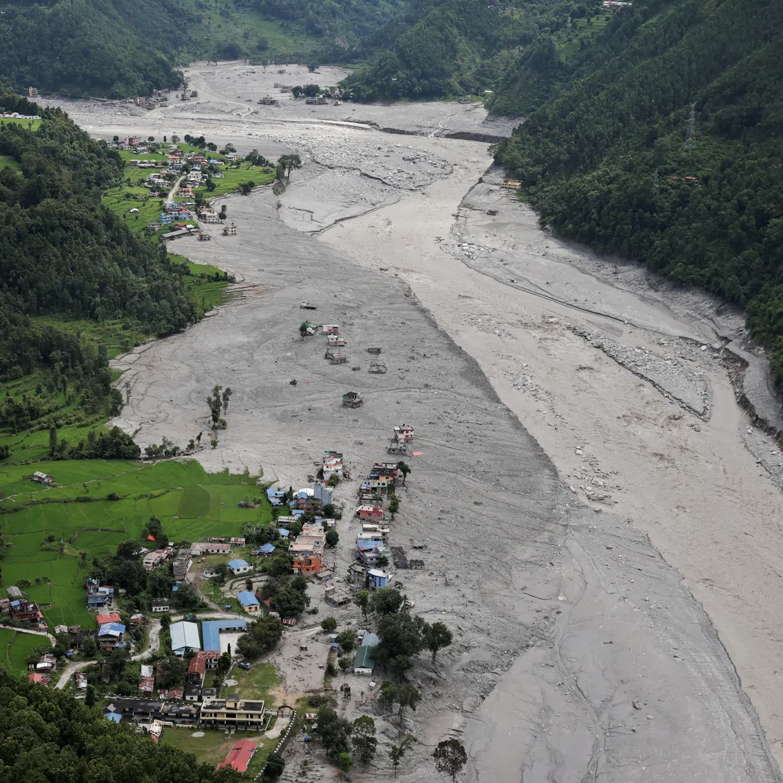 An aerial view shows widespread destruction following the deadly flash floods and mudslides along Nuwakot Trishuli River, in Nuwakot district, Nepal, September 3, 2026. REUTERS/Navesh Chitrakar