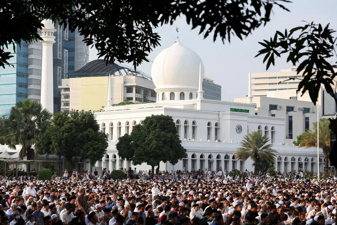 Indonesian Muslims attending mass prayers during Eid al-Adha celebrations at the Great Mosque of Al-Azhar in Jakarta in June. 