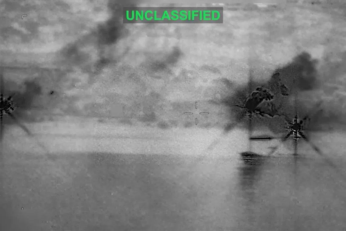 Smoke rises at an unknown location following what the U.S. Central Command says is a new wave of strikes against Iran on Tuesday after three tankers were hit by projectiles in the Strait of Hormuz, in this still image taken from video released July 7, 2026.    U.S. Central Command/Handout via REUTERS