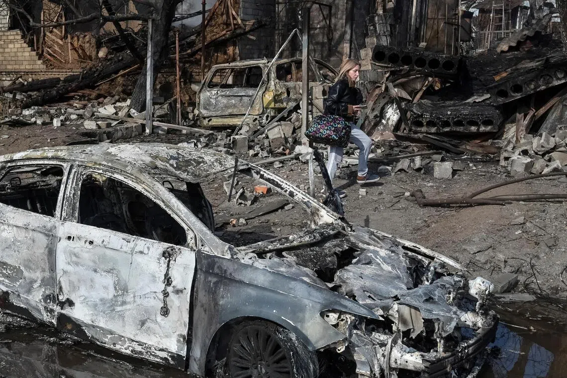 The aftermath of a late-night Russian drone attack on the southeastern Ukrainian city of Dnipro, on March 29.